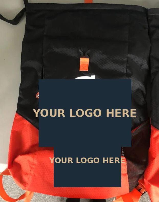 Black and orange drawstring pack with a front pocket and contrasting tab