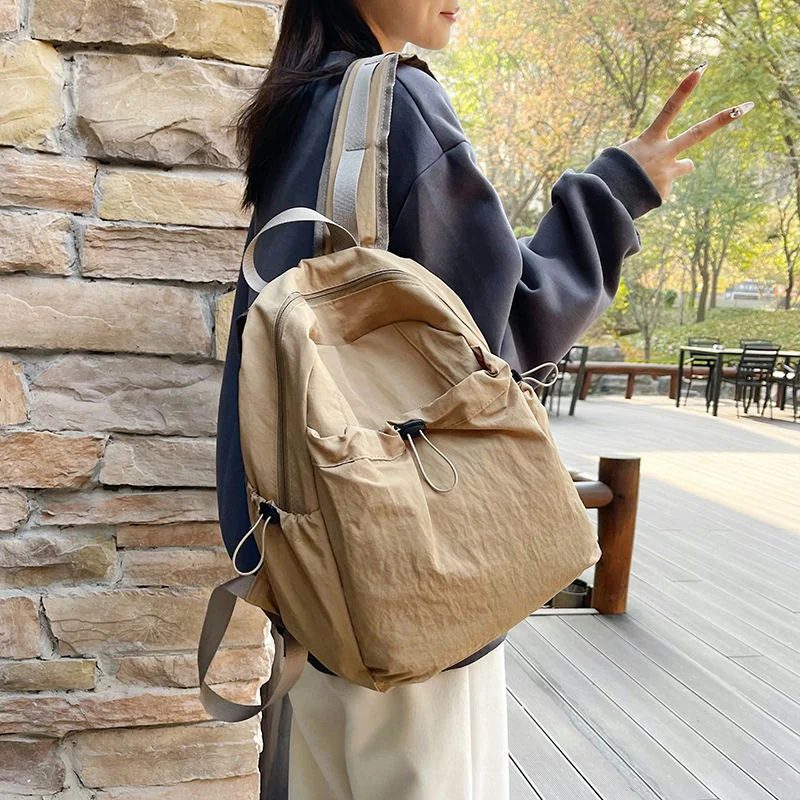 Backpack with gathered front and side pockets FF-176 by Feima Bag