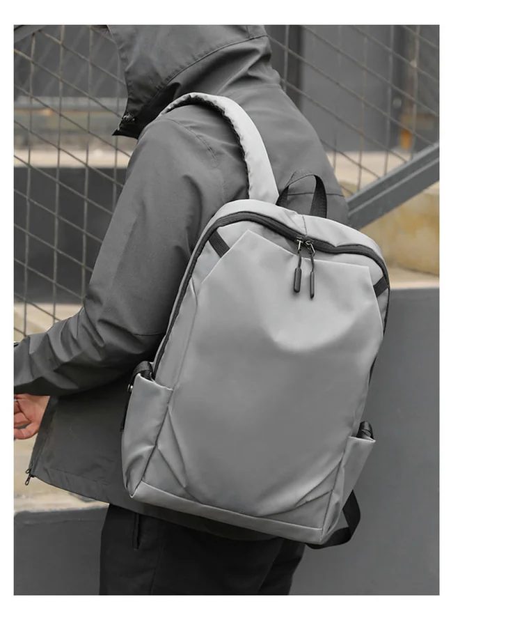 Backpack with a plain front and curved top zip FF-191 by Feima Bag