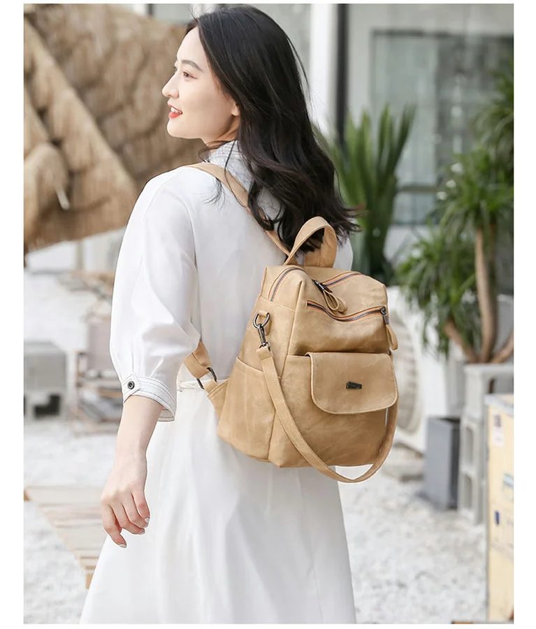 PU backpack with curved zips and front flap pocket FF-195 by Feima Bag