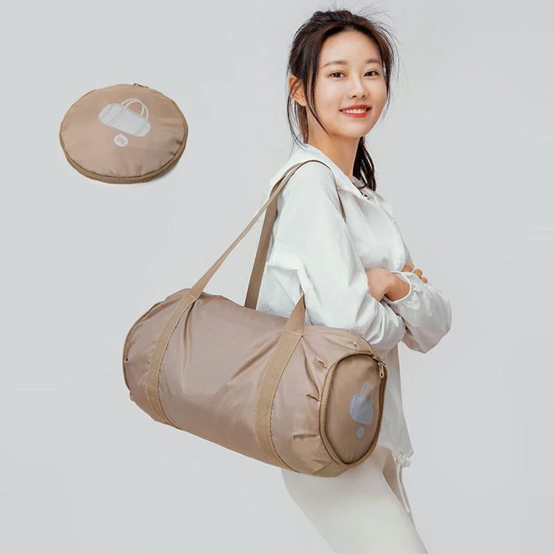 Folding barrel duffel with a round pouch form FA-068 by Feima Bag
