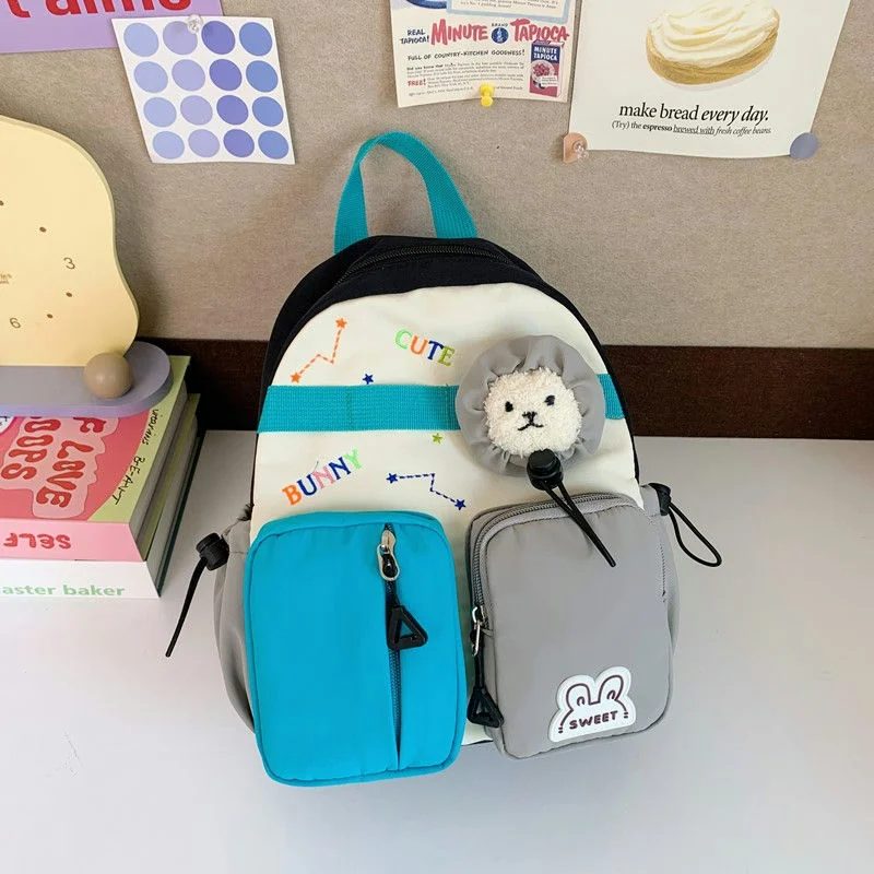 School Backpack with Twin Front Pouches and Face Detail FG-156 by Feima Bag