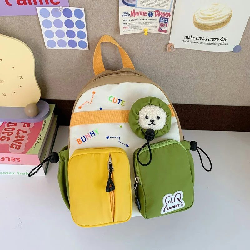 School Backpack with Twin Front Pouches and Face Detail FG-156 by Feima Bag