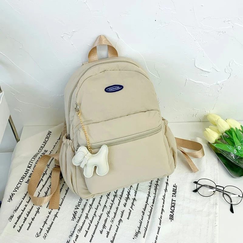 School Backpack with Gathered Side Pockets and Oval Label FG-159 by Feima Bag