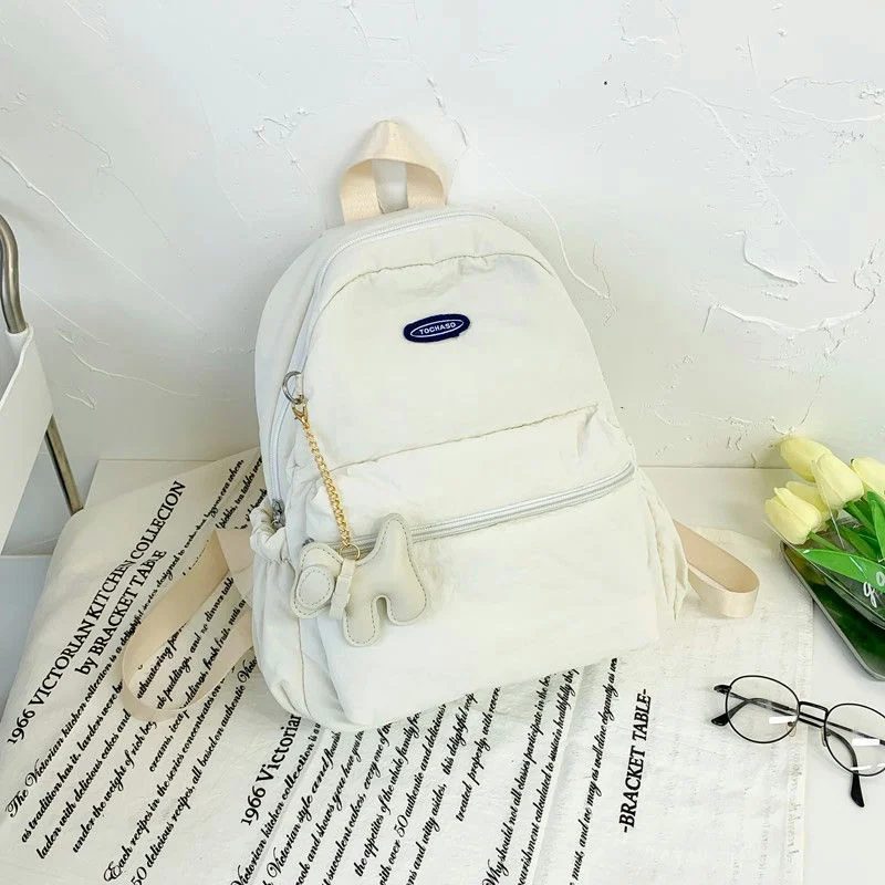 School Backpack with Gathered Side Pockets and Oval Label FG-159 by Feima Bag