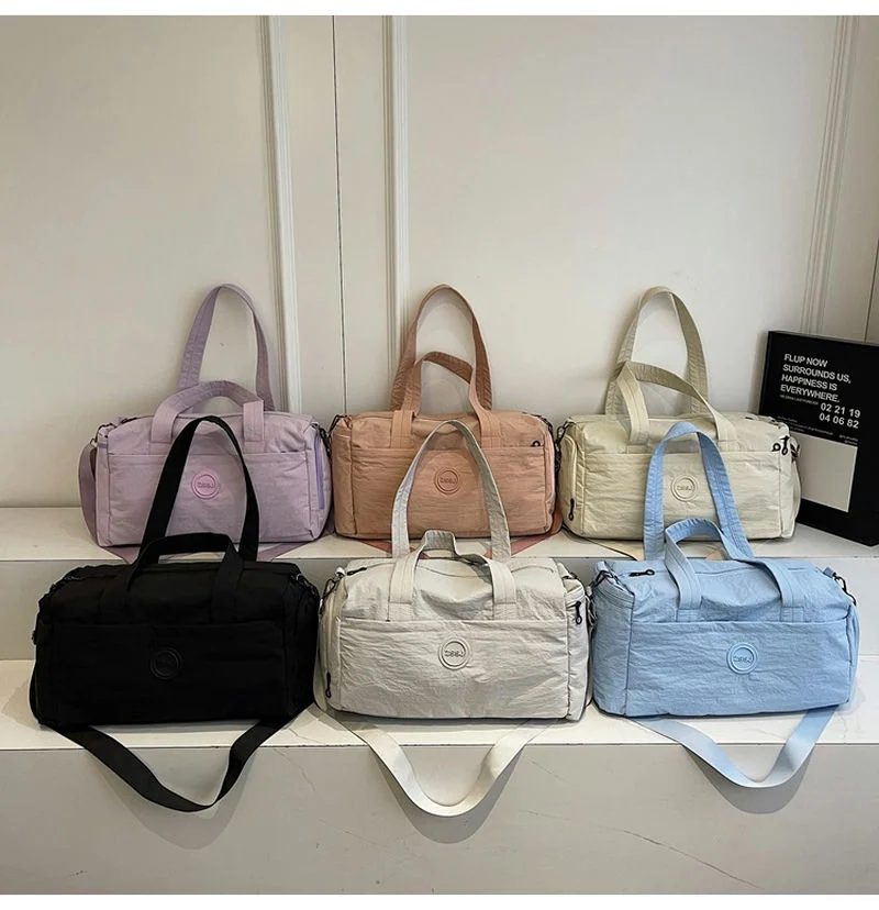 Duffel with a round front label and long handles FS-006 by Feima Bag